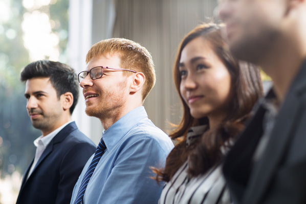 Sales representatives at a national sales meeting