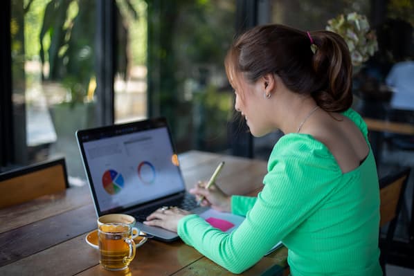 marketer analyzing her brand's share of voice